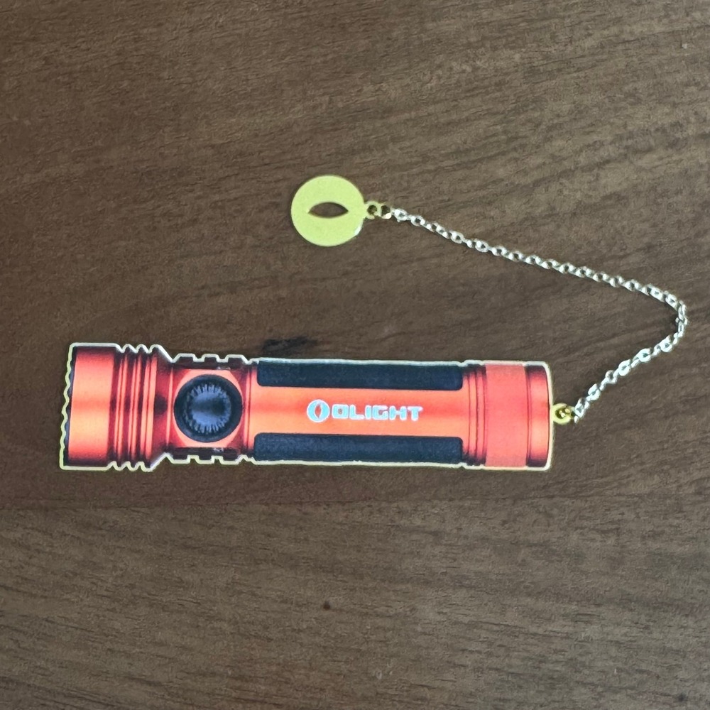 Olight Flashlight Metal Bookmark Orange EDC Accessory with Gold Tone Chain Charm